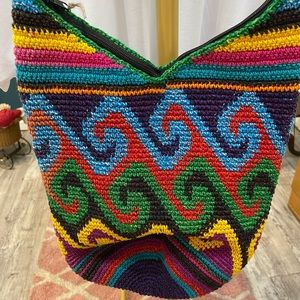 You’ll love this multicolored purse heavy material